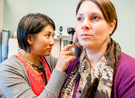 Vermont health professional with patient