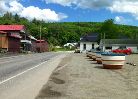 road, road shoulder and large flower pots