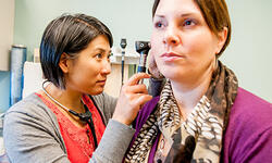 Vermont health professional with patient