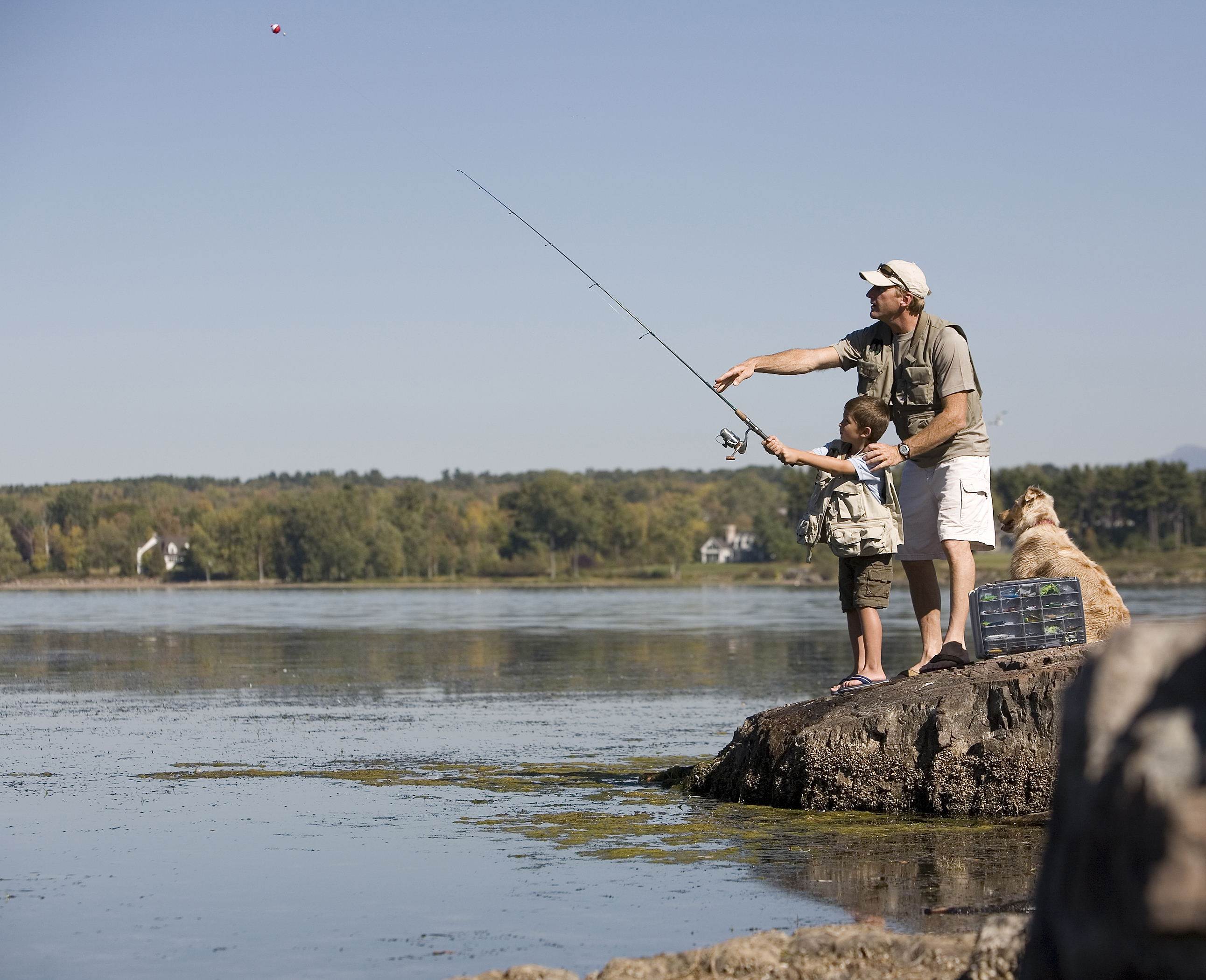 dad and boy fishing