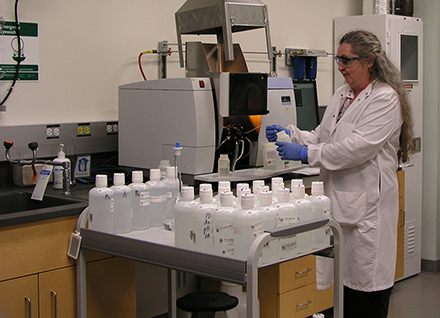 Lab staff doing test.
