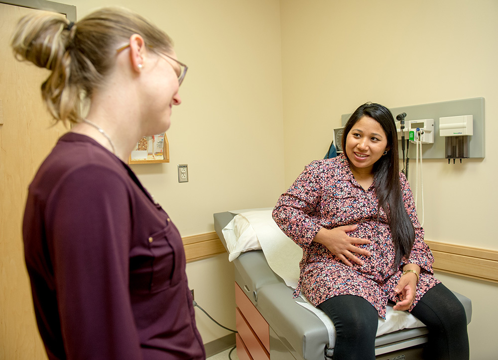 women in maternity appointment