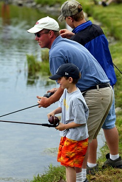 Two Men and Boy Fishing two men and boy fishing