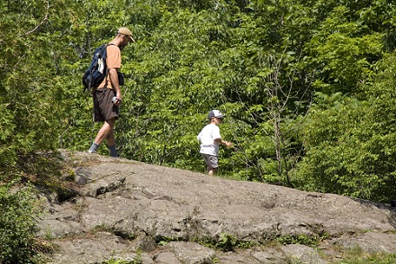Man and Child Hiking man and child hiking