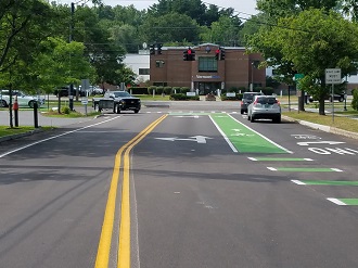 street with bike lane and sidewalk street with bike lane and sidewalk