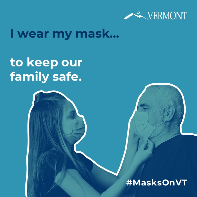 "I wear my mask to keep my family safe" young woman putting mask on older man
