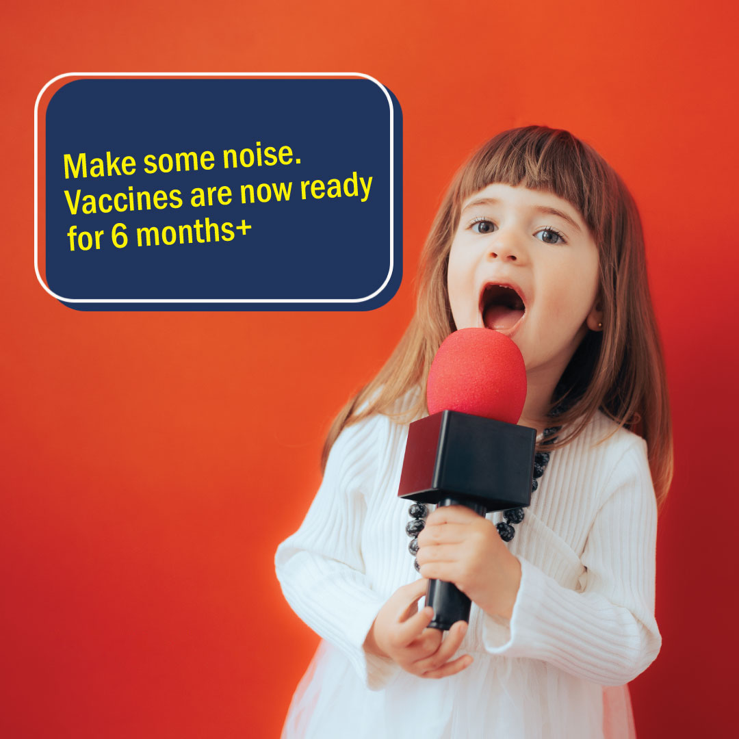 Child singing in microphone with words make some noise. vaccines now ready for 6 months +
