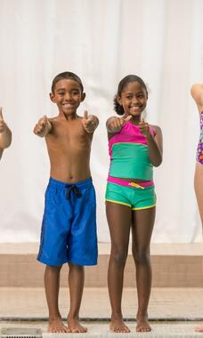 Kids outside pool