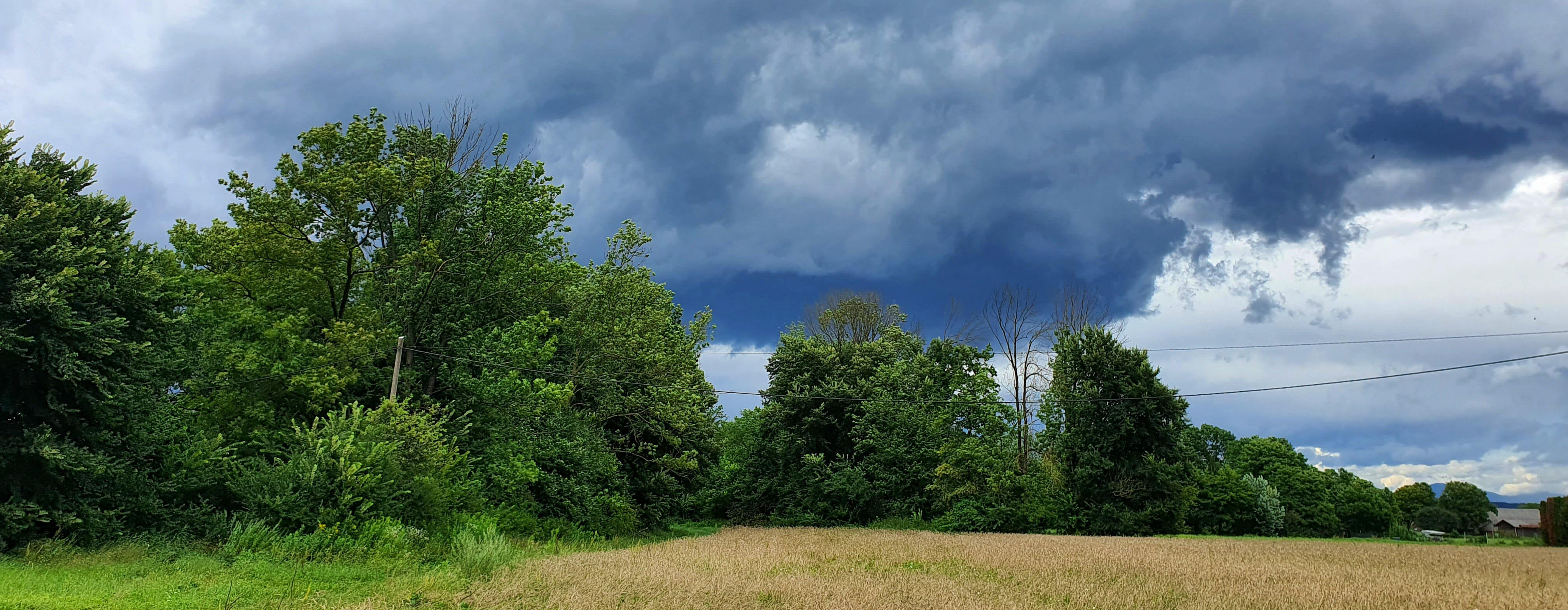Storm clouds over a farm.