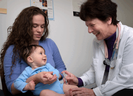 Infant receiving vaccine
