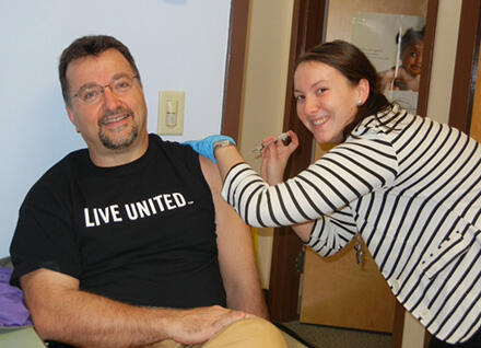 public health nurse giving Tdap vaccine at Vermont local health office