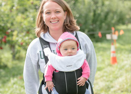 Mom Baby Carrier Mom with baby in a carrier