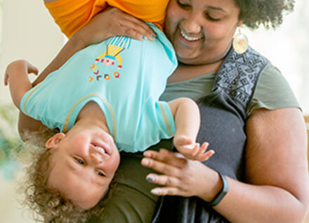 mom and child playing