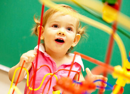 toddler with toy