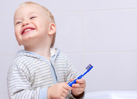 Child With Toothbrush