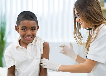 boy getting vaccination