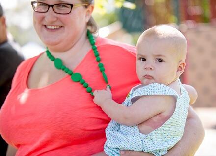 woman holding baby