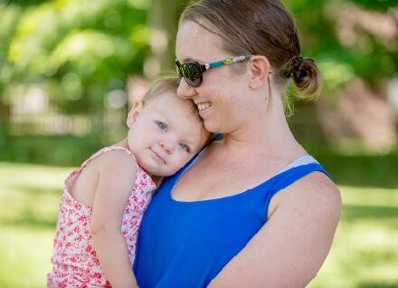 woman holding child