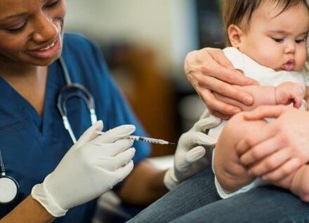 Baby getting a vaccine Baby getting a vaccine