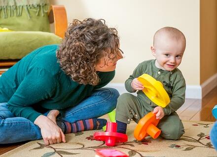 woman and toddler playing