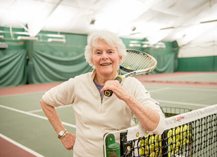 older Vermont woman at tennis court older Vermont woman at tennis court