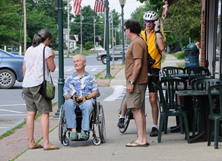 street conversation in Bristol, VT