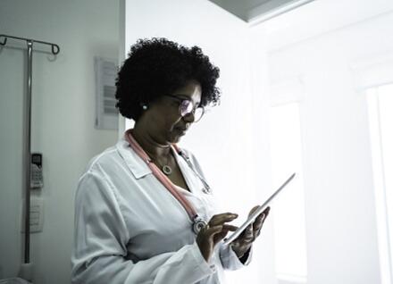 doctor looking at notes