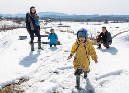 family out in the snow