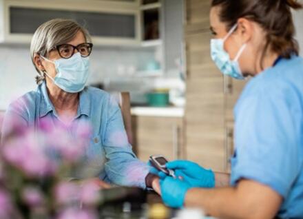 woman talking to health care provider