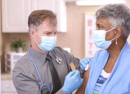 Older person getting a vaccine