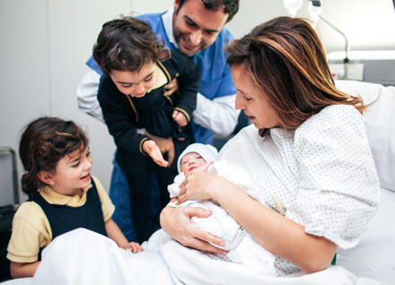 family with newborn baby family with newborn baby