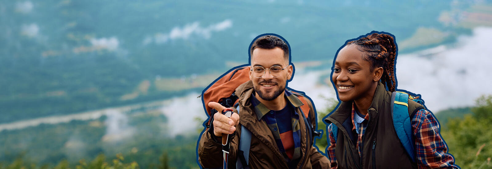 Two people hiking.