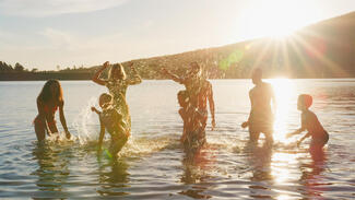 Families splashing in lake