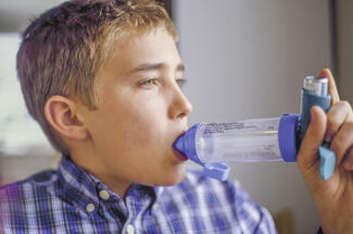 Boy with inhaler