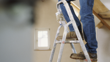 legs of someone on a ladder