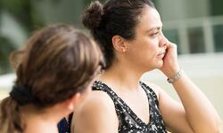 woman looking thoughtful
