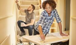 man and woman painting