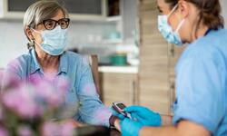 woman talking to health care provider